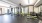 large room with lots of exercise equipment