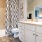 a bathroom with a tub sink and toilet